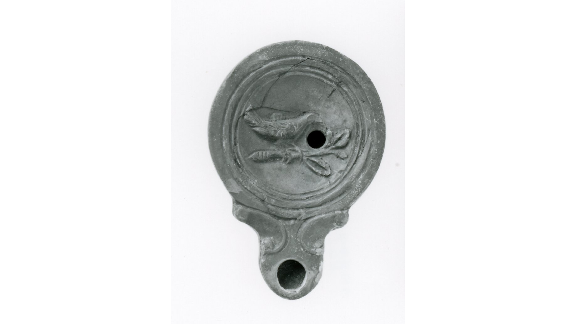 La chouette et les oiseaux chanteurs : Image d'élément iconograpique:Lampe à huile décorée avec un oiseau sur une branche, Provenance : Chypre, 40-100 après J.-C., British Museum, Londres, Royaume-Uni.